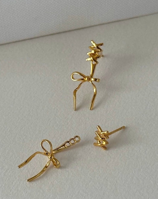 Elegant Ballet Bow Gold Ribbon Silver Earrings Close Up