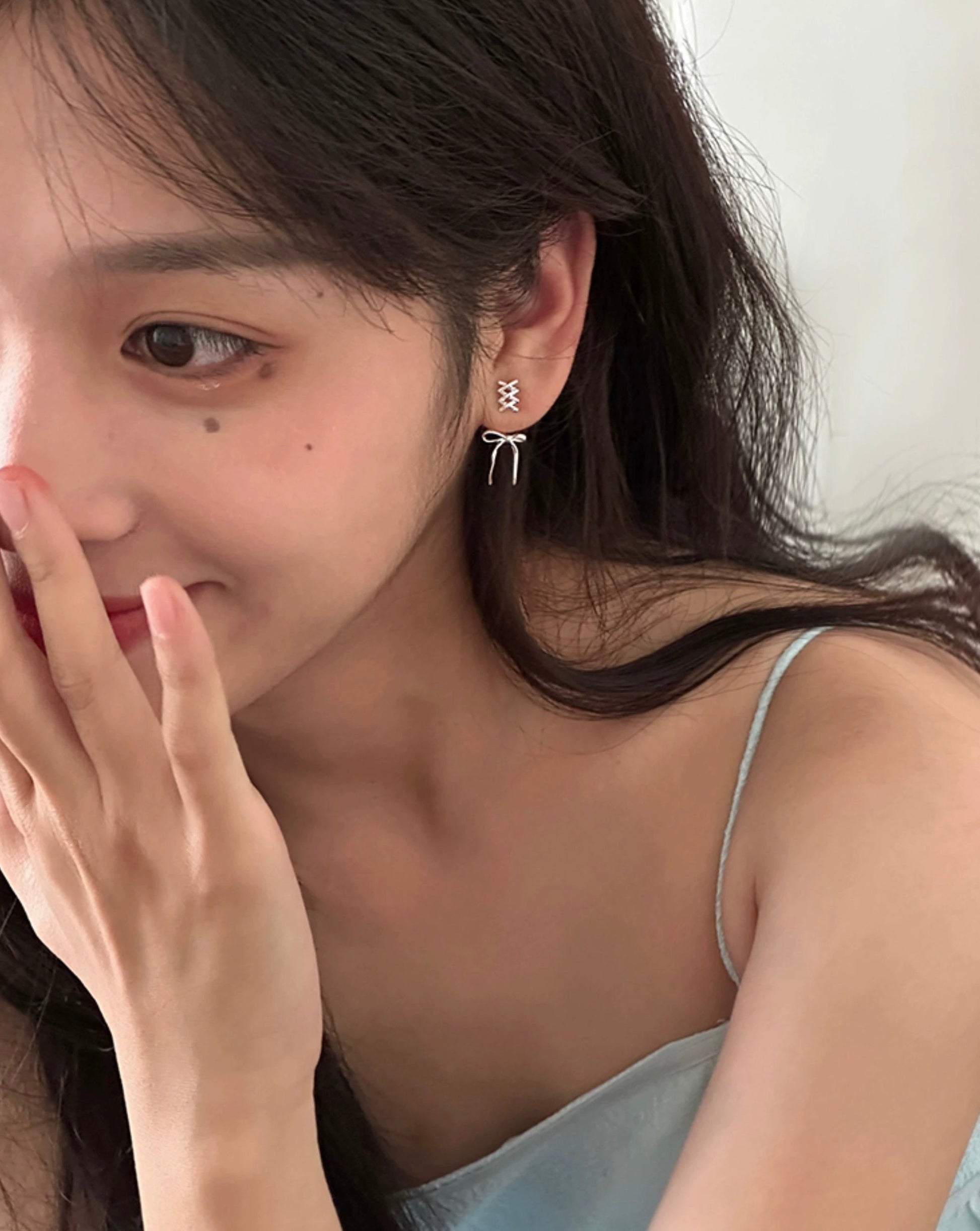 Elegant Ballet Bow Silver Ribbon Silver Earrings Close Model