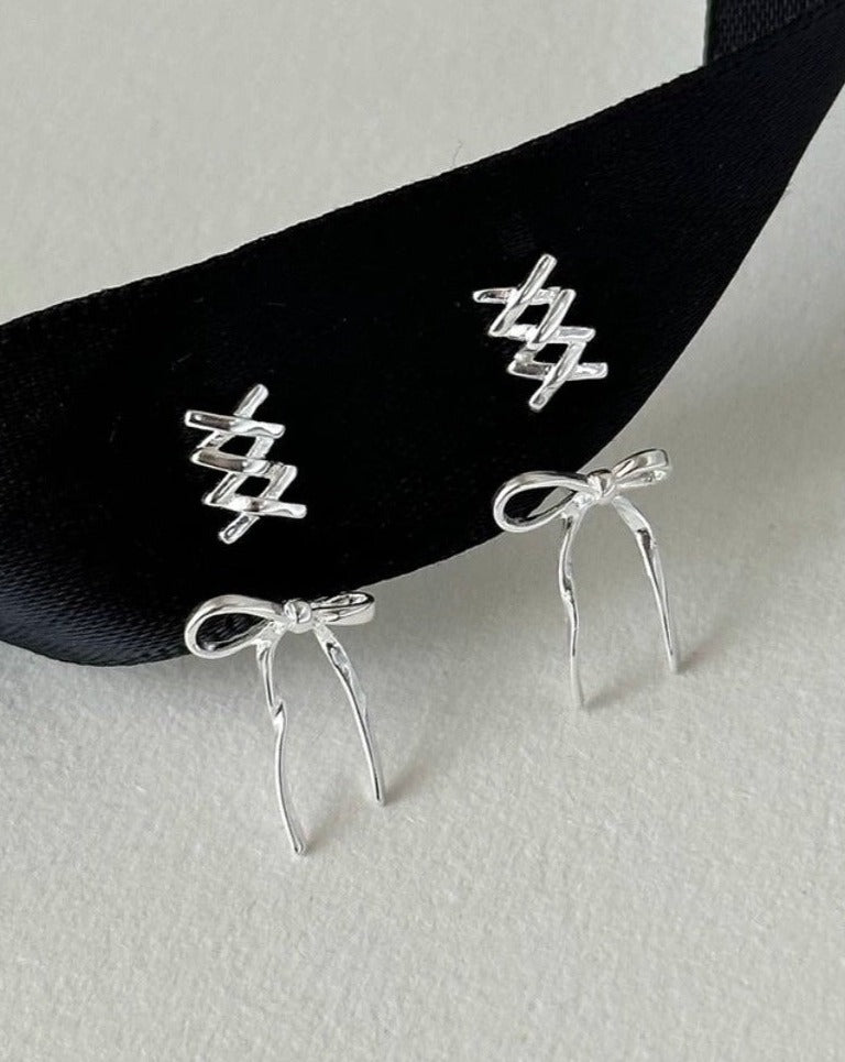 Elegant Ballet Bow Silver Ribbon Silver Earrings Close Up