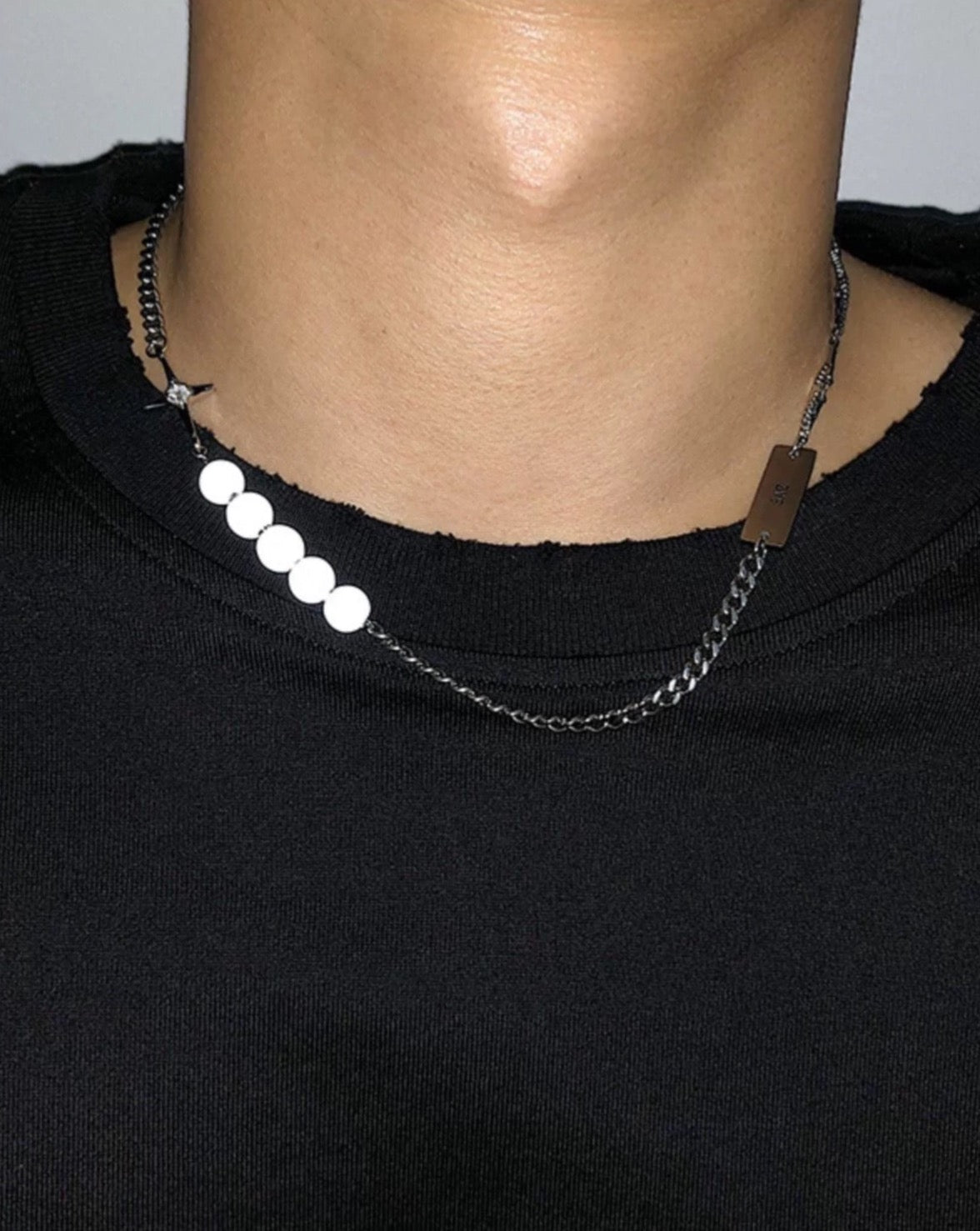 Eye-Catching Reflective Pearl Cross Necklace Model Close Up