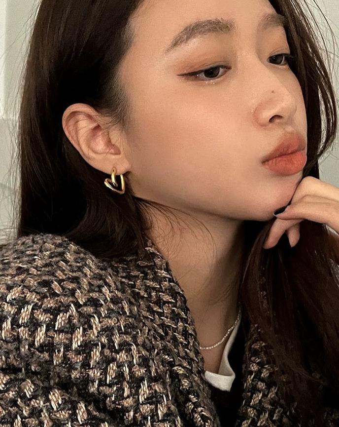 Gold Heart Shape Earrings on Model