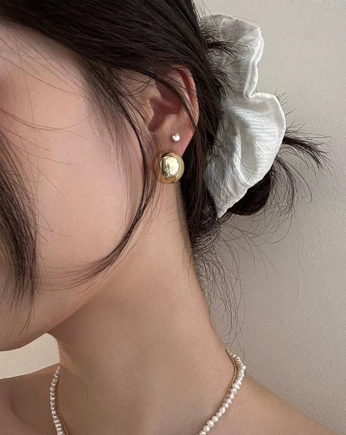 Gold Round Ball Earrings on Model