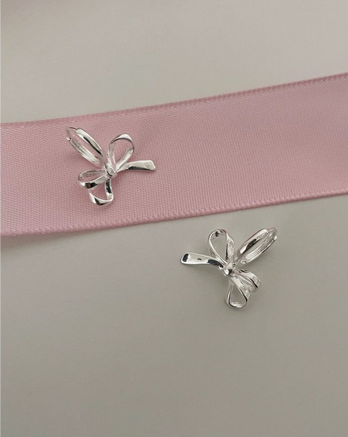 Luxury Chic Bow Style Silver Earrings Close Up