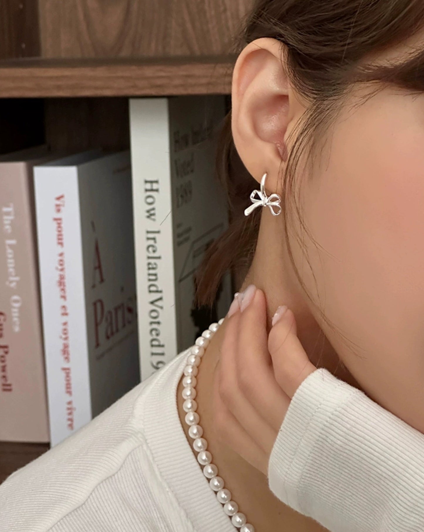 Luxury Chic Bow Style Silver Earrings Close Up Model