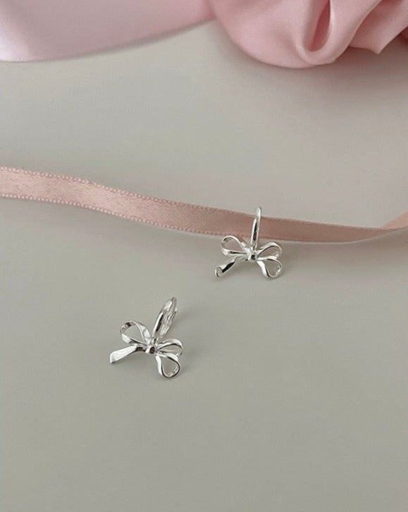 Luxury Chic Bow Style Silver Earrings Close Up Pic
