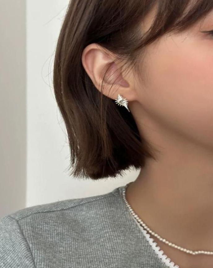Girl wearing Seashell Silver Earrings