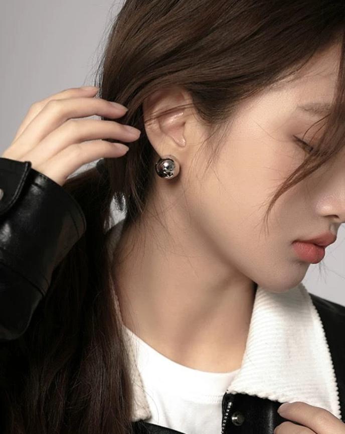 Silver Round Ball Earrings on Model